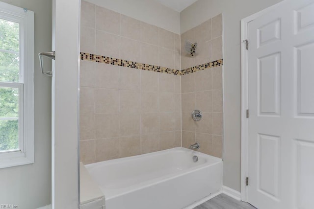 814 E 26th St, Norfolk, VA 23504 - full bath with healthy amount of natural light, shower / washtub combination, and baseboards