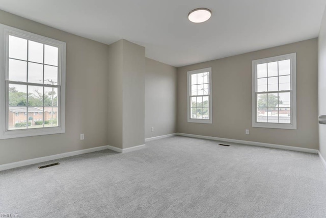 814 E 26th St, Norfolk, VA 23504 - spare room featuring baseboards and carpet flooring