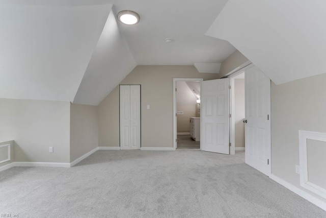 814 E 26th St, Norfolk, VA 23504 - additional living space featuring carpet, vaulted ceiling, and baseboards