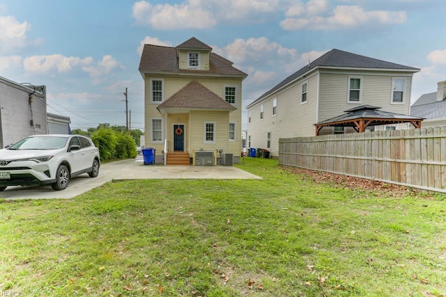 814 E 26th St, Norfolk, VA 23504 - back of house featuring central AC unit, a gazebo, a patio, entry steps, and a shingled roof
