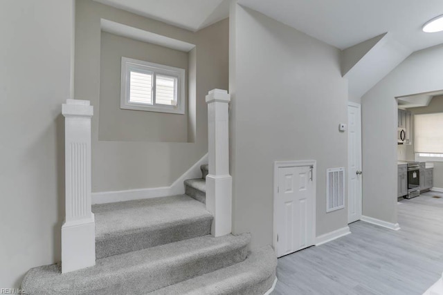 814 E 26th St, Norfolk, VA 23504 - staircase with baseboards and wood finished floors