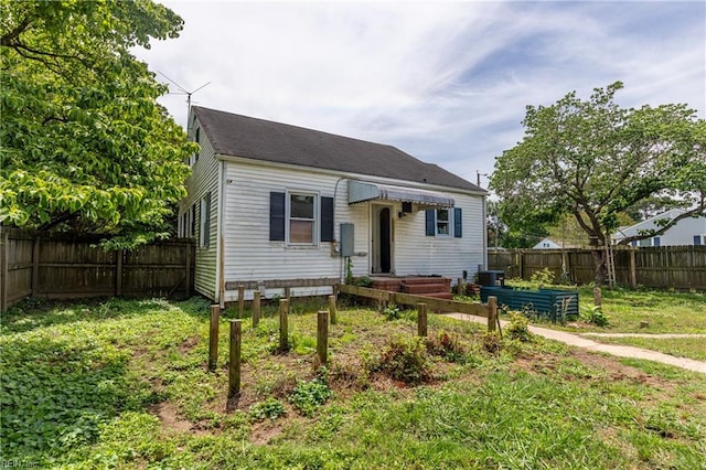 409 Wingfield Ave, Chesapeake, VA 23325 - bungalow-style home featuring a garden and central AC unit