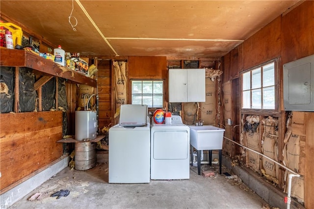 409 Wingfield Ave, Chesapeake, VA 23325 - washroom with washer and clothes dryer, electric panel, healthy amount of natural light, and water heater