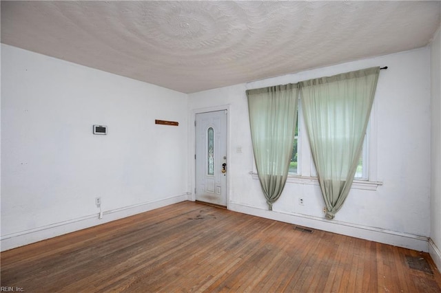 409 Wingfield Ave, Chesapeake, VA 23325 - spare room featuring wood-type flooring and baseboards