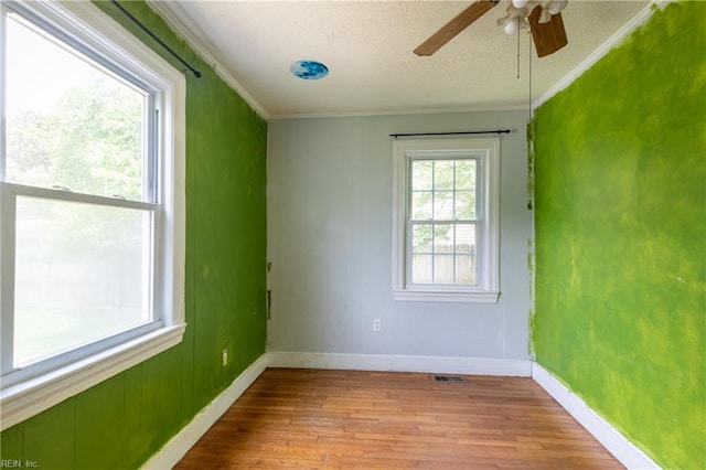 409 Wingfield Ave, Chesapeake, VA 23325 - unfurnished room featuring wood finished floors, baseboards, ceiling fan, and crown molding