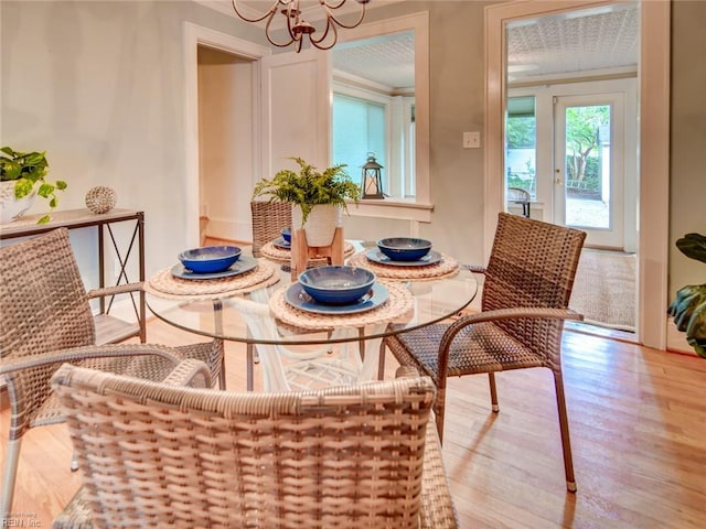 203 Sinclair St, Norfolk, VA 23505 - dining space with wood finished floors and a chandelier