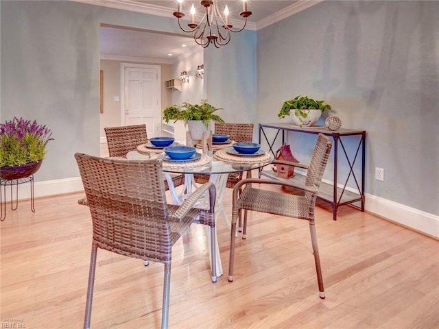 203 Sinclair St, Norfolk, VA 23505 - dining area with ornamental molding, wood finished floors, baseboards, and a chandelier