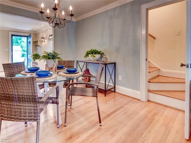 203 Sinclair St, Norfolk, VA 23505 - dining space featuring wood finished floors, stairs, crown molding, a chandelier, and baseboards
