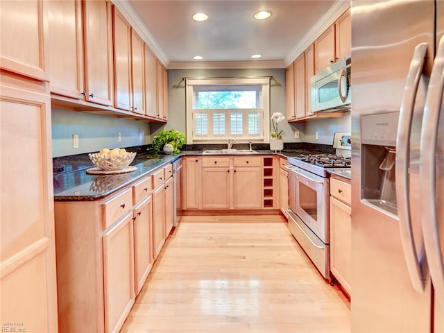 203 Sinclair St, Norfolk, VA 23505 - kitchen with stainless steel appliances, a sink, crown molding, light wood-style floors, and light brown cabinets