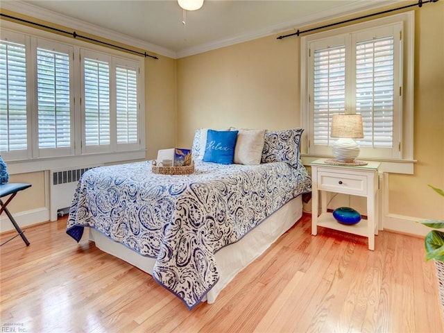 203 Sinclair St, Norfolk, VA 23505 - bedroom featuring wood finished floors, crown molding, baseboards, and radiator heating unit