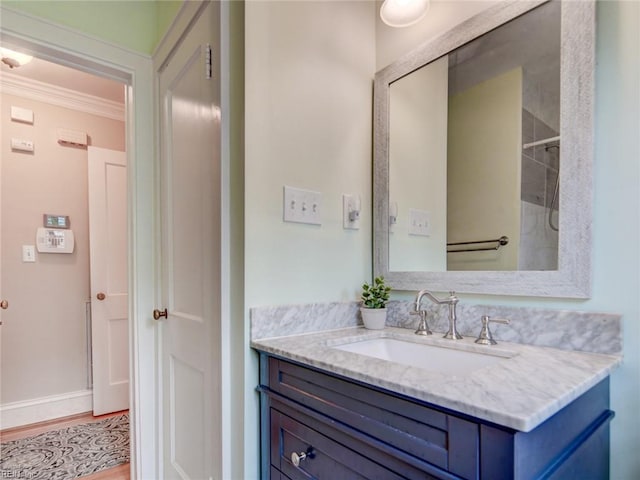 203 Sinclair St, Norfolk, VA 23505 - bathroom featuring vanity, crown molding, wood finished floors, and baseboards