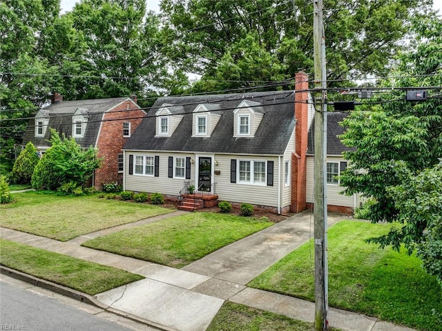 203 Sinclair St, Norfolk, VA 23505 - view of front of property featuring a chimney, a front lawn, driveway, and roof with shingles