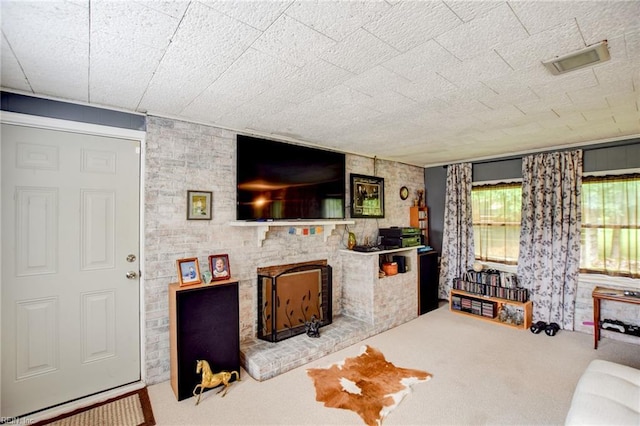 9206 Dixon Rd, Suffolk, VA 23433 - living area featuring carpet floors and a fireplace