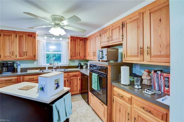 9206 Dixon Rd, Suffolk, VA 23433 - kitchen featuring oven, a sink, a center island, ceiling fan, and stainless steel microwave