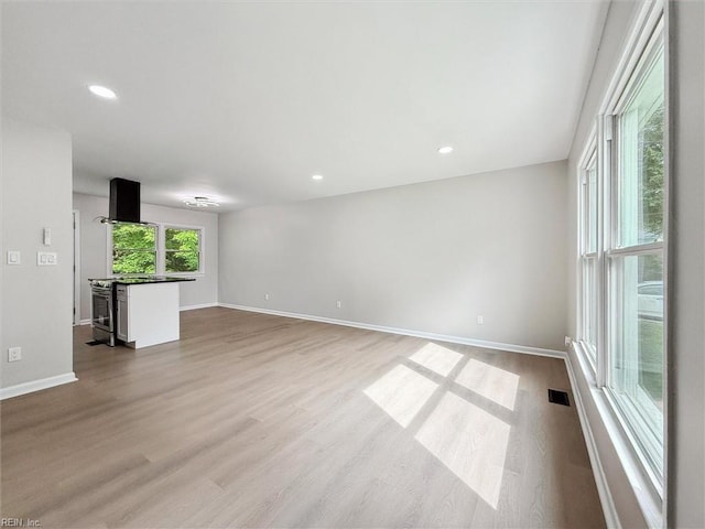 428 Maryle Ct, Newport News, VA 23602 - unfurnished living room with wood finished floors, baseboards, and recessed lighting