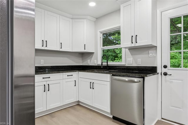 428 Maryle Ct, Newport News, VA 23602 - kitchen with stainless steel appliances, plenty of natural light, a sink, white cabinetry, and recessed lighting