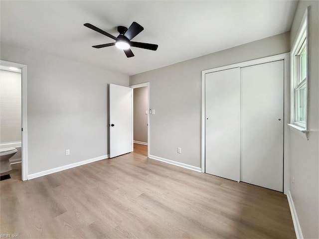 428 Maryle Ct, Newport News, VA 23602 - unfurnished bedroom with light wood-type flooring, ensuite bathroom, and baseboards