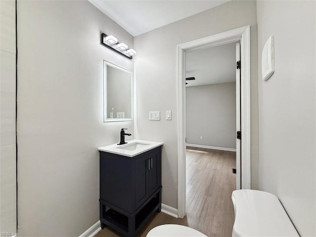 428 Maryle Ct, Newport News, VA 23602 - bathroom with toilet, vanity, wood finished floors, and baseboards