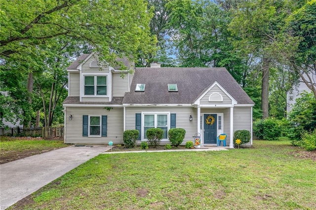 8 Alton Ct, Hampton, VA 23669 - view of front facade with a chimney, concrete driveway, and a shingled roof