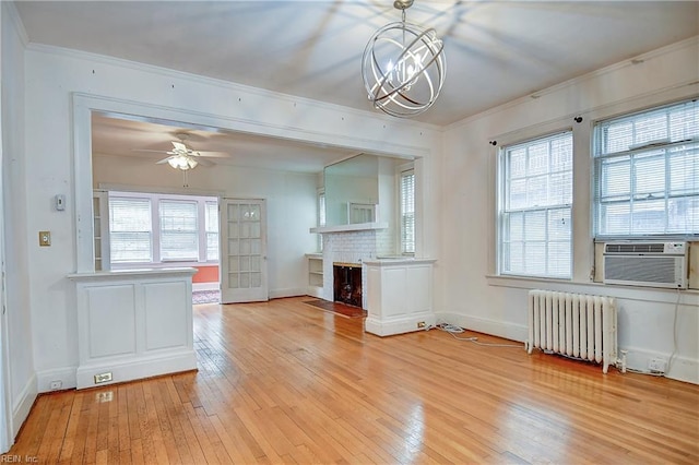 751 Shirley Ave, Norfolk, VA 23517 - unfurnished living room with radiator heating unit, cooling unit, light wood finished floors, crown molding, and ceiling fan