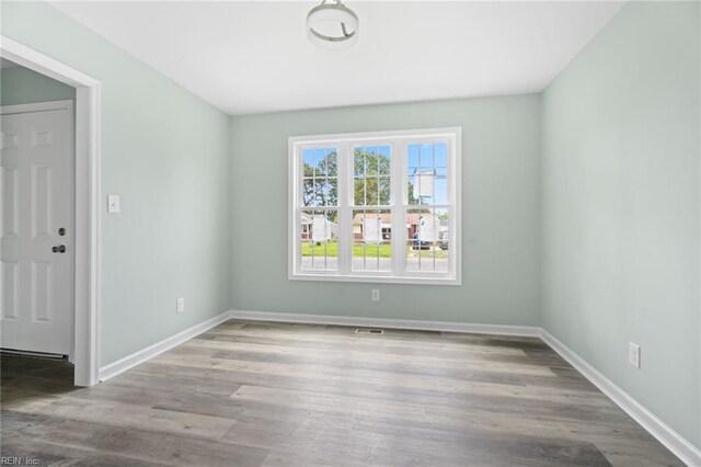 2915 Berkley Ave, Chesapeake, VA 23325 - unfurnished room featuring baseboards and wood finished floors