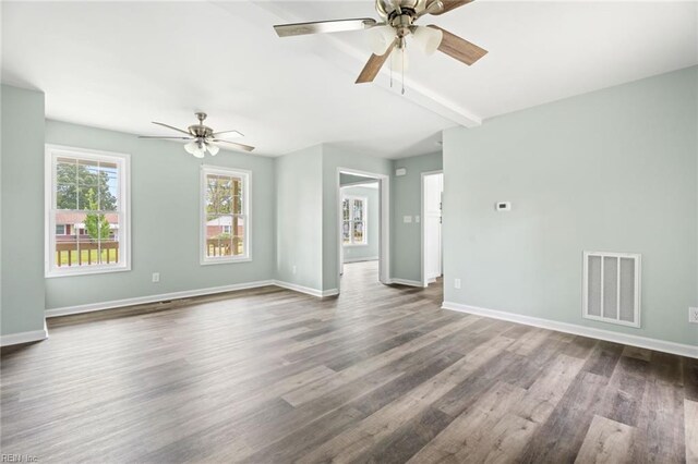 2915 Berkley Ave, Chesapeake, VA 23325 - unfurnished living room featuring a ceiling fan, dark wood-type flooring, baseboards, and beam ceiling