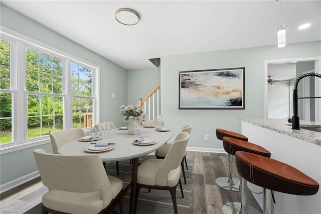 2915 Berkley Ave, Chesapeake, VA 23325 - dining area featuring plenty of natural light, baseboards, dark wood finished floors, and stairway