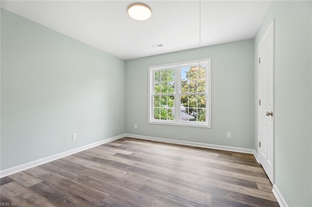 2915 Berkley Ave, Chesapeake, VA 23325 - spare room with wood finished floors and baseboards