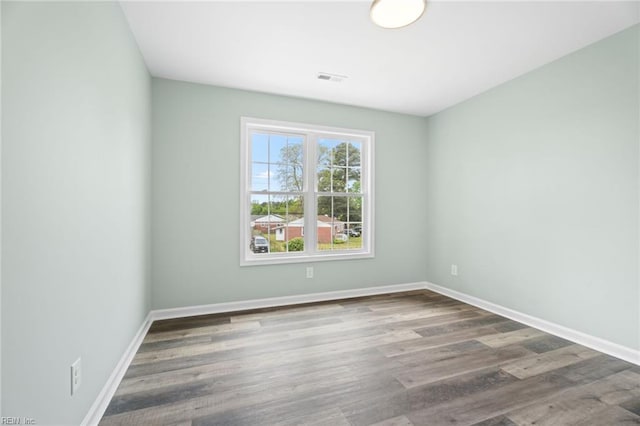 2915 Berkley Ave, Chesapeake, VA 23325 - unfurnished room with baseboards and wood finished floors