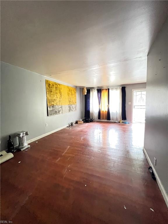 418 Fox Hill Rd, Hampton, VA 23669 - unfurnished living room featuring baseboards and wood finished floors
