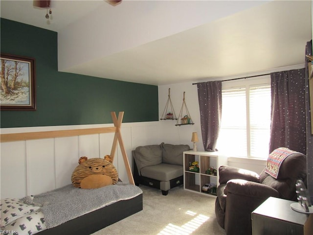 21139 Reynolds Dr, Carrollton, VA 23314 - bedroom featuring carpet flooring, wainscoting, and a decorative wall