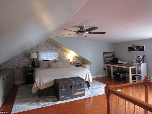 21139 Reynolds Dr, Carrollton, VA 23314 - bedroom with wood finished floors, baseboards, lofted ceiling, and a ceiling fan