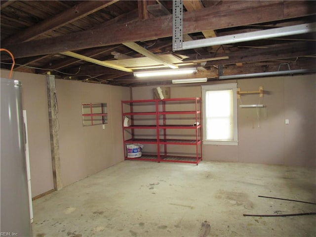 21139 Reynolds Dr, Carrollton, VA 23314 - garage featuring fridge