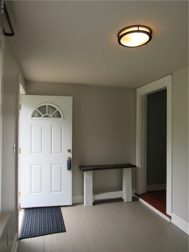 21139 Reynolds Dr, Carrollton, VA 23314 - entryway with wood finished floors and baseboards