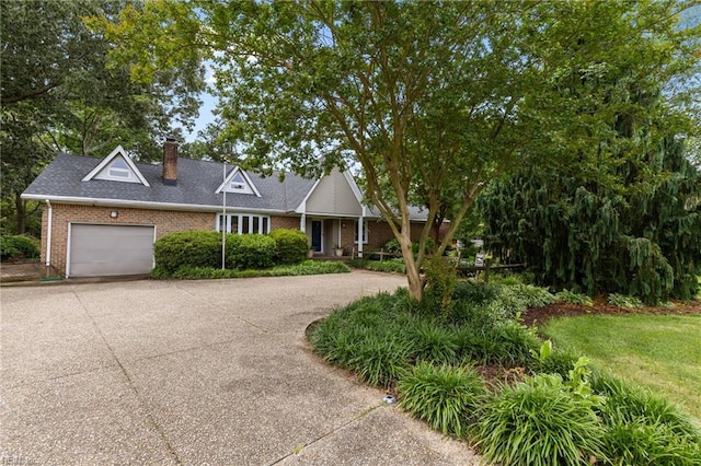 5409 Challedon Dr, Virginia Beach, VA 23462 - view of front of property featuring concrete driveway, brick siding, a chimney, and an attached garage