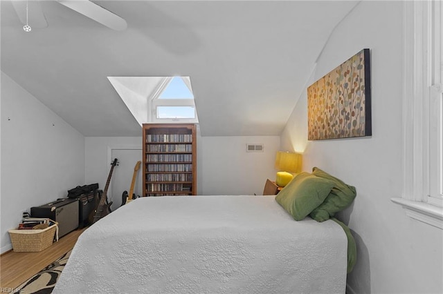 5409 Challedon Dr, Virginia Beach, VA 23462 - bedroom featuring vaulted ceiling, wood finished floors, and ceiling fan