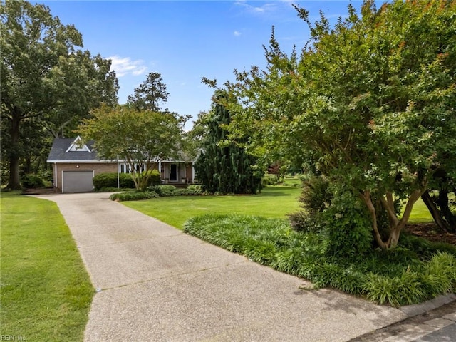 5409 Challedon Dr, Virginia Beach, VA 23462 - view of property hidden behind natural elements with a front lawn, a garage, and concrete driveway