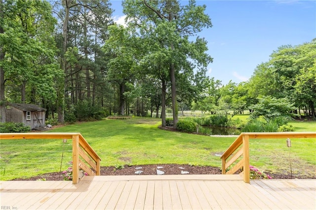 5409 Challedon Dr, Virginia Beach, VA 23462 - deck featuring a yard, an outbuilding, and view of scattered trees