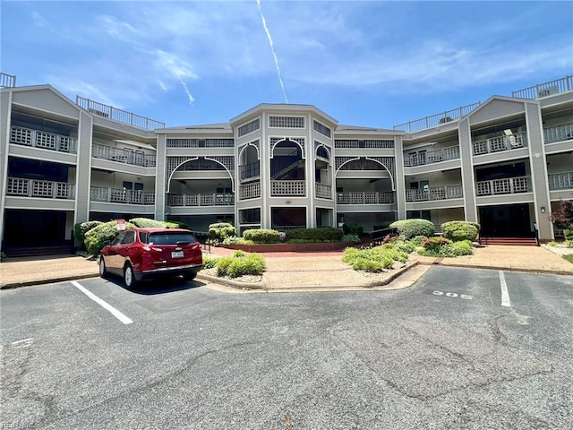 30 Brough Ln # 301, Hampton, VA 23669 - view of building exterior featuring uncovered parking