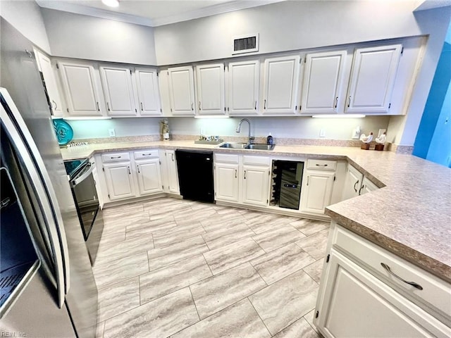 30 Brough Ln # 301, Hampton, VA 23669 - kitchen featuring stainless steel appliances, a sink, crown molding, light countertops, and wine cooler
