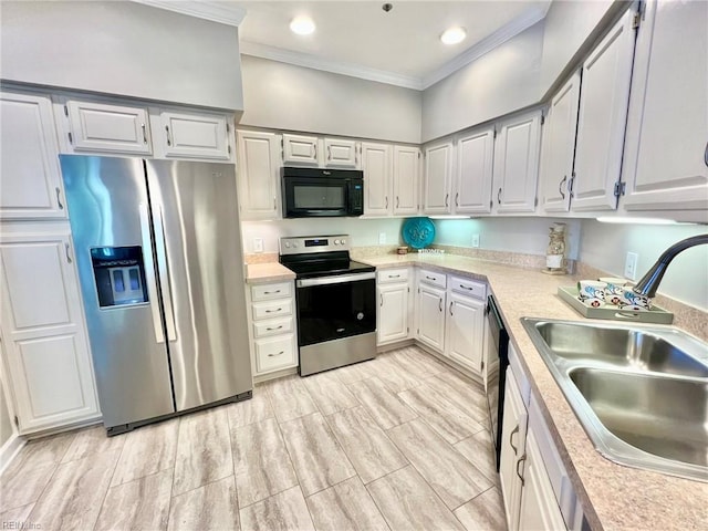 30 Brough Ln # 301, Hampton, VA 23669 - kitchen featuring black appliances, a sink, light countertops, crown molding, and recessed lighting