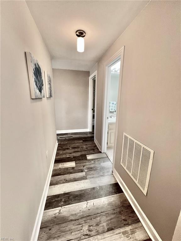 30 Brough Ln # 301, Hampton, VA 23669 - corridor with wood finished floors and baseboards