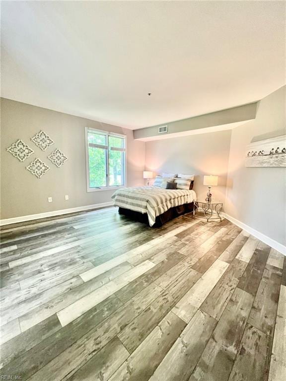 30 Brough Ln # 301, Hampton, VA 23669 - bedroom featuring hardwood / wood-style floors and baseboards