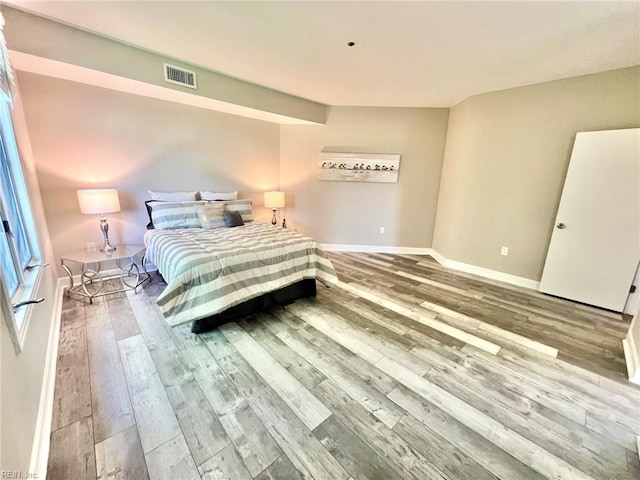 30 Brough Ln # 301, Hampton, VA 23669 - bedroom with wood finished floors and baseboards