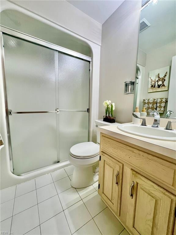 30 Brough Ln # 301, Hampton, VA 23669 - full bathroom with vanity, tile patterned floors, a shower stall, and toilet