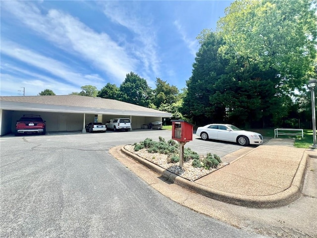 30 Brough Ln # 301, Hampton, VA 23669 - view of asphalt road featuring curbs