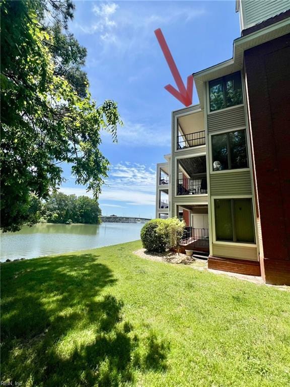 30 Brough Ln # 301, Hampton, VA 23669 - view of green lawn with a water view and a balcony