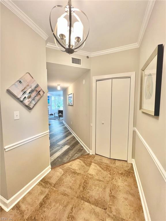 30 Brough Ln # 301, Hampton, VA 23669 - hallway with crown molding, a chandelier, and baseboards