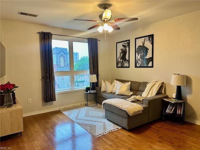 388 Boush St Unit 307, Norfolk, VA 23510 - living area with plenty of natural light, a ceiling fan, wood finished floors, and baseboards