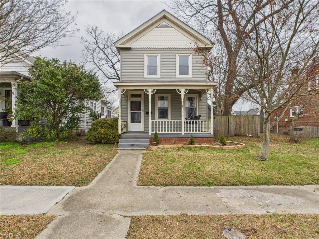 12 Holly St, Hampton, VA 23669 - victorian house featuring a porch